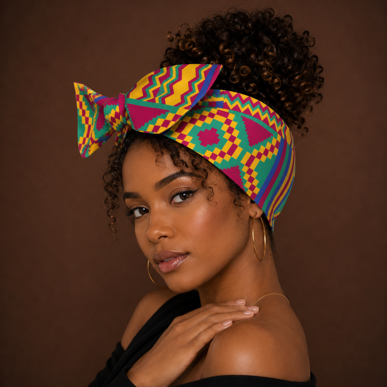 Bandeau wax africain Madras multicolore porté avec nœud — imprimé rose vert jaune — Cissey Clothing