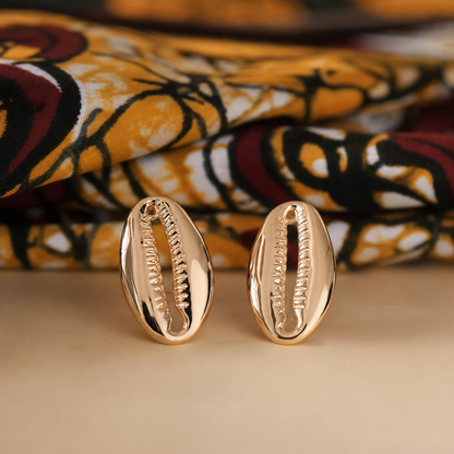 Boucles d'Oreilles Cauri — posées sur tissu wax — Cissey Clothing